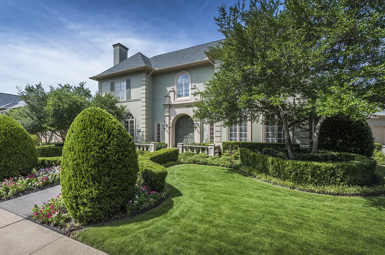 Beautiful home with bright green grass